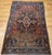 "An elegant early 20th-century Persian Bidjar area rug, masterfully hand-knotted and showcasing a bold medallion design...