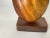 This sculpture is in wood, in brown color. The shape in at the same time, abstract, in the style of Alexandre Noll It has...