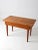 An antique primitive farmhouse table with a beautifully weathered, rustic character. The slat-wood top is grounded by...