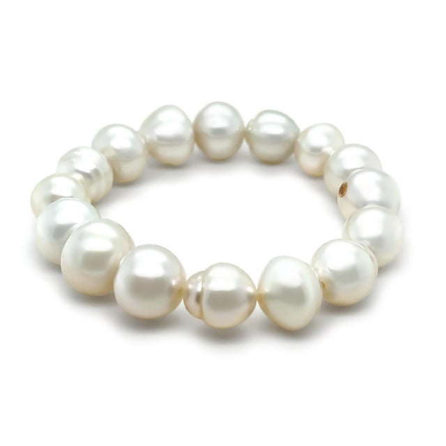 A beautiful Paspaley Delfini strand bracelet showcasing an appealing array of Australian South Sea Pearls, carefully...