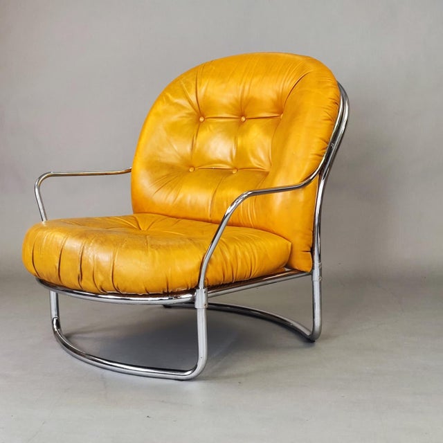 Iconic vintage armchair designed by Carlo de Carli for CiDue, an Italian design from the 1960s. Chromed tubular metal...
