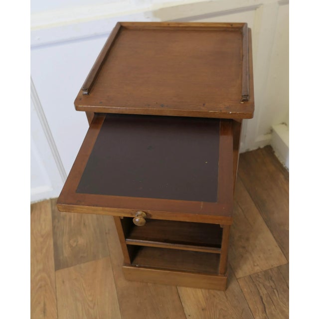 Bedside Cupboard with Brushing Slide This is an unusual piece, it has a small gallery around the top with a brushing side...