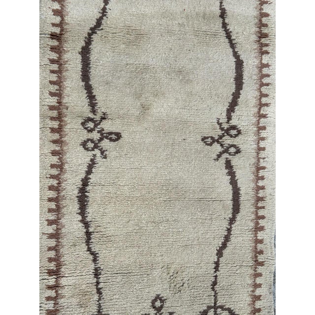 Nice mid 20th century Moroccan rug with a design of the French art deco rugs and nice colours with a white background and...