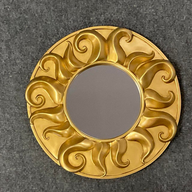 This is a beautiful Gold Sun Wall Mirror. It's a wonderful choice for an accent and can be grouped with other mirrors or...