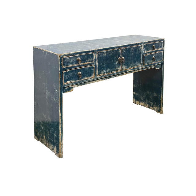 Add a touch of timeless, vintage-inspired charm to your home with this handcrafted distressed blue console table. Expertly...