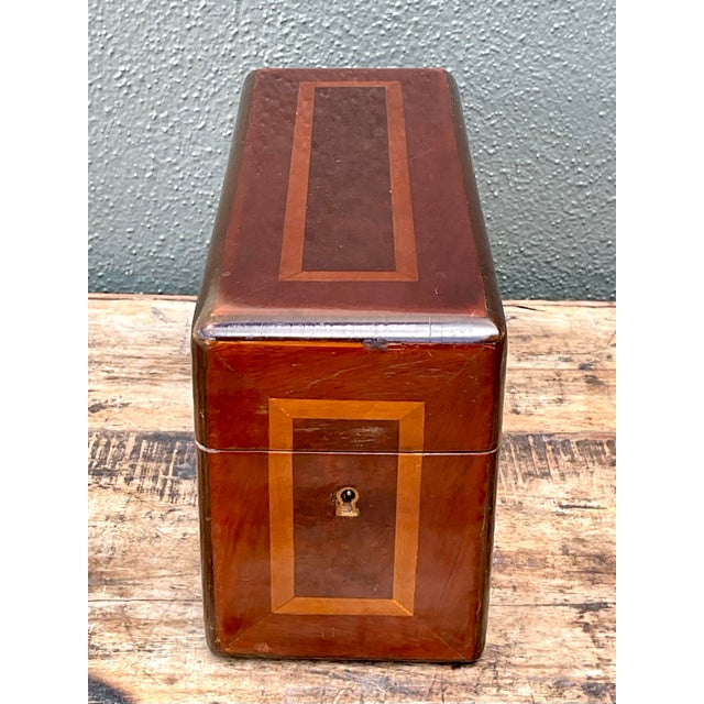 This elegant English Regency-style storage box is a beautiful testament to classic woodworking and refined, traditional...