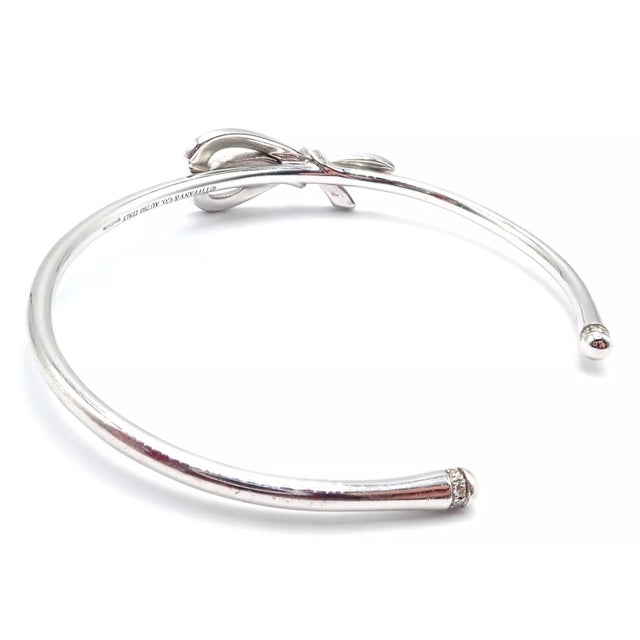 Late 20th Century Tiffany & Co. White Gold Diamond Bow Ribbon Bangle Cuff Bracelet For Sale In Philadelphia - Image 6 of 10