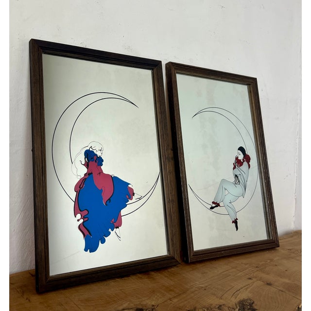 This pair of stunning Art Deco mirrors depicting a Pierrot and Harlequin on a crescent moon is an illustration, first and...