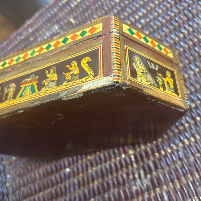 Egyptian Revival Handmade box circa 1925. This box has Egyptian hyroglyphic designs on the lid and all around the edges....