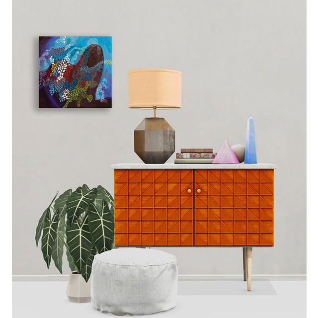 The Turtle moves slowly through an ocean of colors, carrying its world upon its back — a symbol of patience, endurance,...