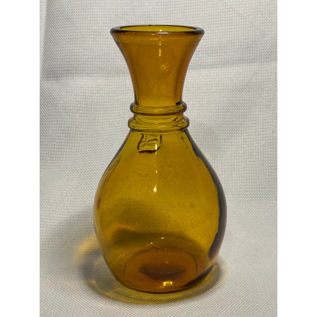 This gorgeous little carafe (or decanter) was an exceptional find. The little bubbles in the glass indicated a mid-20th...