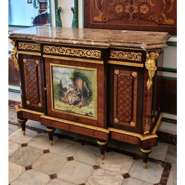 Make a striking statement with this grand French Louis XVI-inspired sideboard, a substantial and beautifully detailed...