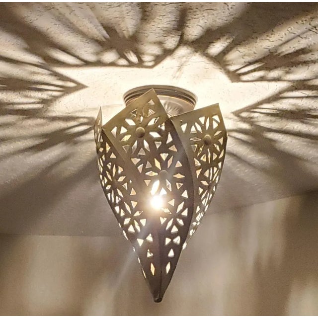 Traditional handmade Moroccan - metal only - lantern. Gold finish . Adds a great ambiance light to your deck, patio, pool,...