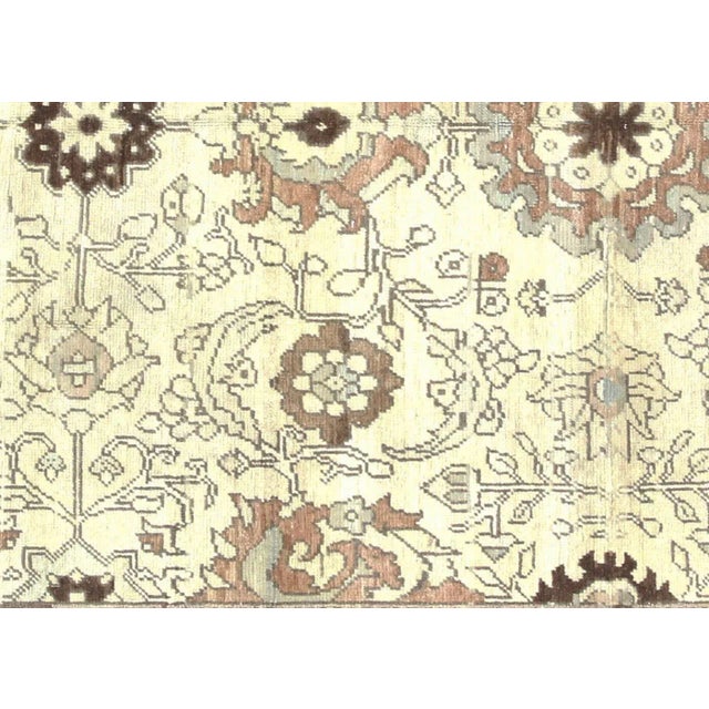 1960s Turkish Oushak Rug. Handwoven with wool on wool foundation in the Oushak region of Western Turkey. The Anatolian...