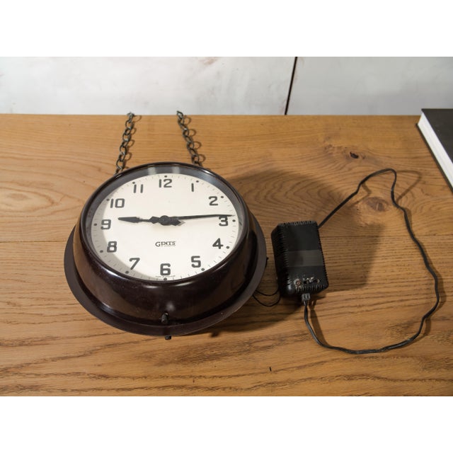 An extraordinary double-sided station clock by Gents of Leicester, Bakelite-housed, running on both of its original slave...