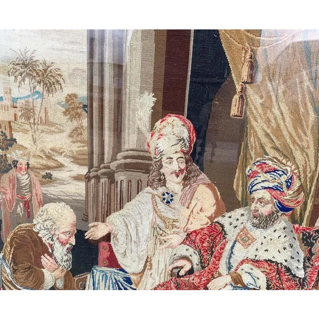 A fine quality continental tapestry needlepoint picture. 19th century. Hand worked showing a biblical scene. In a...