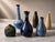 A rare and beautifully curated set of six signed Rörstrand miniature vases, executed in Sweden during the 1950s,...