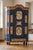 This impressive antique painted cabinet showcases the craftsmanship and decorative traditions associated with Central...