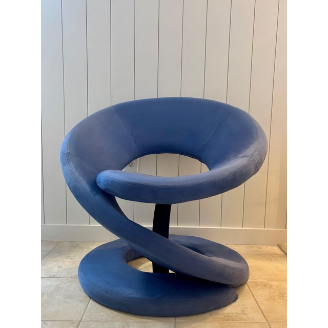 This Jaymar spiral chair is a bold piece of 1970s-inspired postmodern design, built around a single continuous ribbon of...