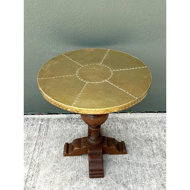 A striking example of mid-century craftsmanship, this vintage pedestal table pairs the warmth of richly patinated wood...