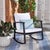 Classic meets contemporary in this sophisticated Daire Rocking Chair. Daires open frame in black PE rattan emanates a...