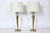 Tall Pair of Rembrandt masterpieces brass "Torch" table lamps with white milk glass shades. Featuring tapered cylindrical...