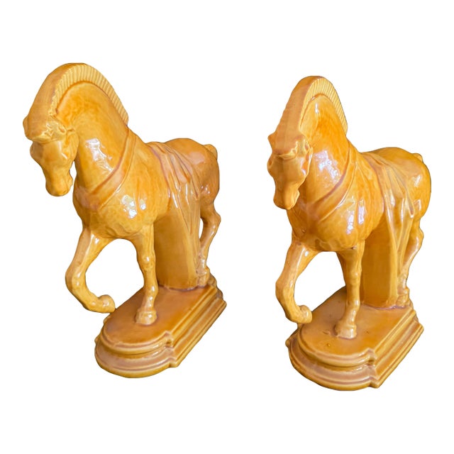 Vintage Hollywood Regency Caramel Ceramic Horse Sculptures - A Pair For Sale