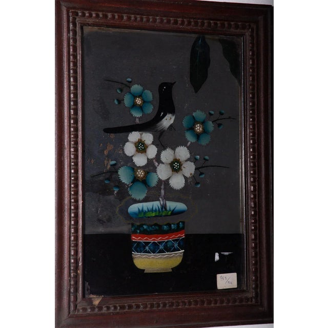 This captivating reverse glass painting, created in China in the early 1800s, captures the essence of natural beauty and...