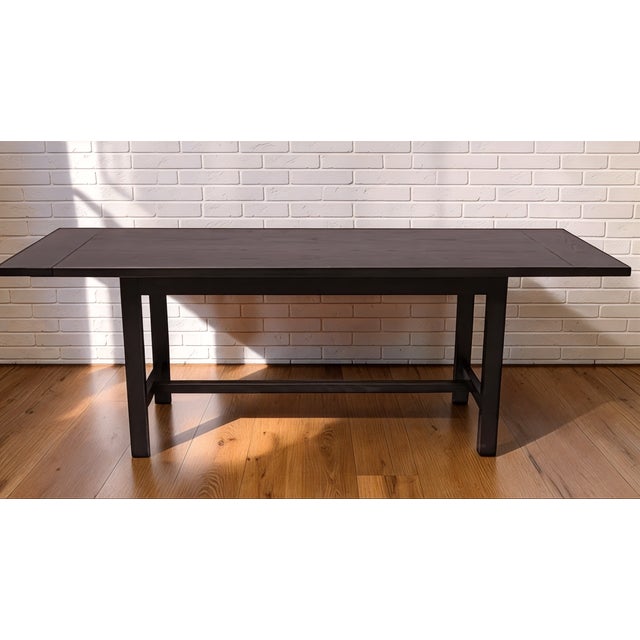 Modern Maxine Snider Black Dining Extension Table. It includes two leaves in original cloth sacks baring the metal plaque...