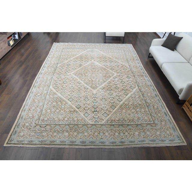Vintage Persian Hand-Knotted area rug is a semi-antique vintage area rug. The '70s Eastern region of Anatolian's unique...