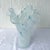 An elegant Italian hand-blown art glass vase crafted in the Murano tradition, featuring a graceful freeform silhouette...