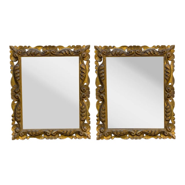 This is a lovely pair of 19th century French carved giltwood mirrors. They have a lovely carved shell motif. Note the hand...
