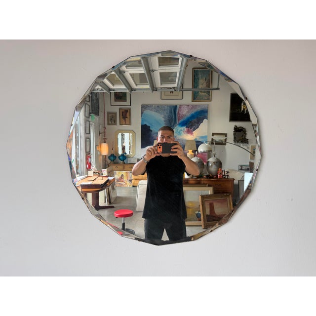 Elegant 1940’s Art Deco Hollywood Regency style wall mirror featuring a striking octagonal form with beautifully beveled...