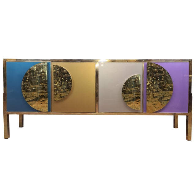 This Murano sideboard is a masterpiece of Italian craftsmanship, blending birch, brass, and Murano glass into a stunning...