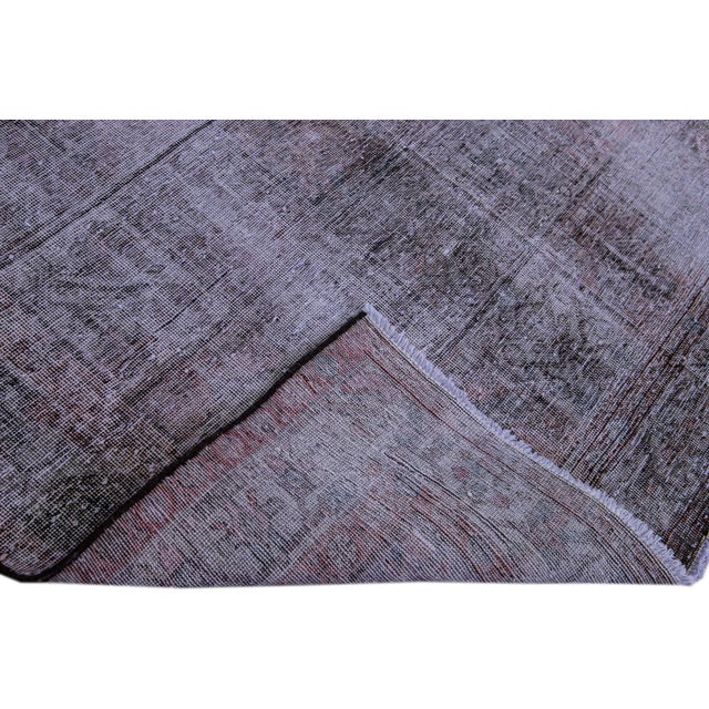 Beautiful Vintage Shabby Chic hand-knotted wool rug with a brown field. This rug has purple accents all-over a distressed...