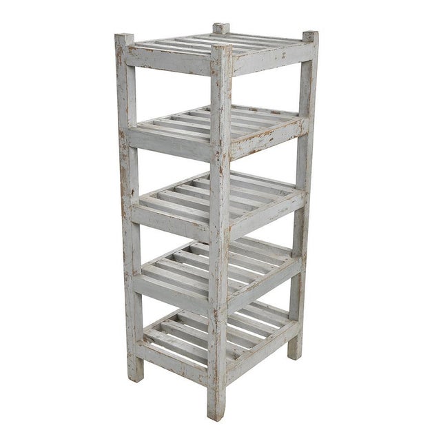 Wooden shelf with white patina. This piece is designed in the style of the selected designer and/or manufacturer