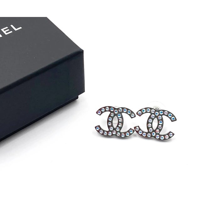 Chanel Silver CC Iridescent Crystal Large Piercing Earrings *Marked 17 *Made in Italy *Comes with the original box, pouch...