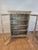 This piece is a 19th-century European Neoclassical display cabinet or bookcase, heavily styled in the Liegoise (Belgian)...