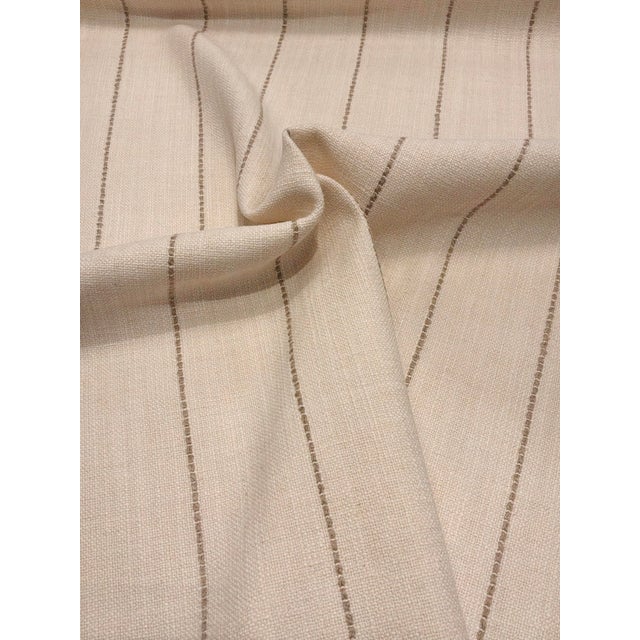 This timeless cotton linen has an off-white and beige colorway and stripe design, it is multipurpose with a soft hand....