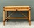 This vintage pencil reed writing desk is a sophisticated embodiment of the organic modernism that defined the 1970s...