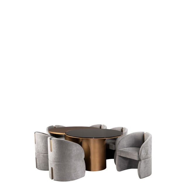 This set comes with a luxury irregular shape dining table and 6 gray chenille velvet upholstered armchair dining chairs....