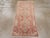 A vintage Turkish Oushak throw rug. In the Caucasian manner, a central teal pole medallion composed of three conjoint...