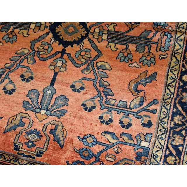 Antique hand made Lilihan rug in red shade with geometric/floral design. The rug is in original good condition from 1920s....