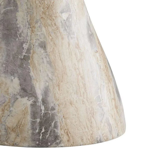 Tricky like trompe l’oeil this stunning table has a secret—though it looks to be made completely of stone lift it and...