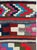 This mid-20th century Persian flatweave kilim rug is a vivid expression of tribal design, characterized by its bold...