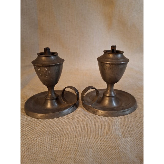 Historical Provenance & Design Significance: Dating from the American Jacksonian Era (c. 1830–1850), this rare pair of...