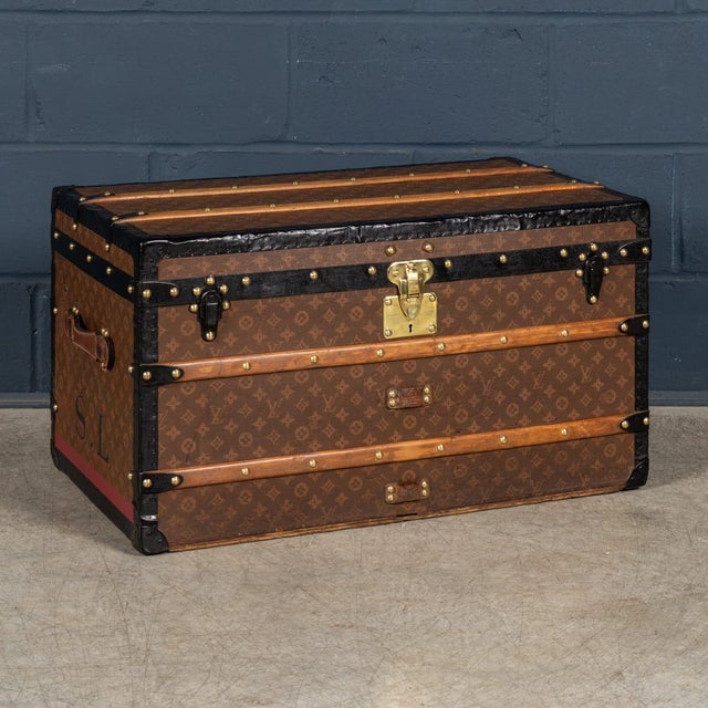 A classic louis vuitton steamer trunk dating to the 1920s, crafted in the iconic monogram canvas with leather trim, brass...