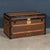 A classic louis vuitton steamer trunk dating to the 1920s, crafted in the iconic monogram canvas with leather trim, brass...