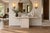 This Italian mid-century modern Postmodern travertine console table, dating to the 1980s, pairs substantial natural stone...