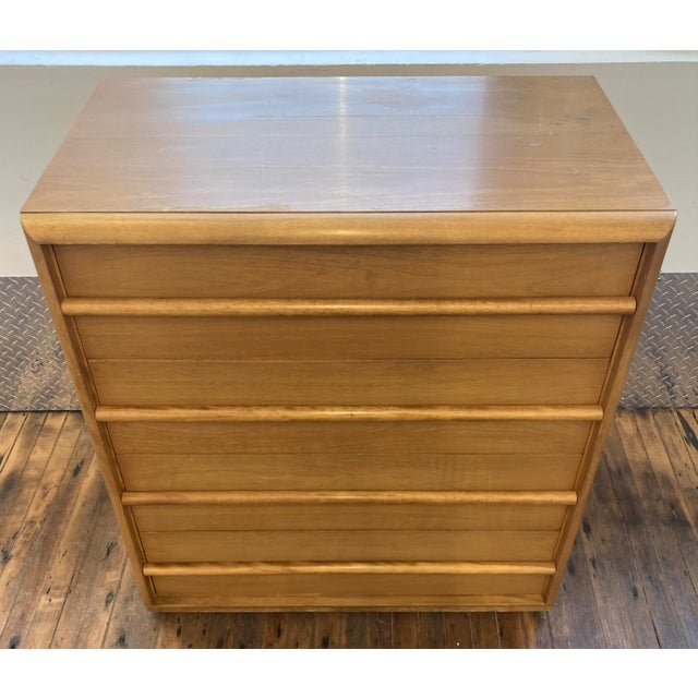 Dated to December 1951, this classic T.J. Robsjohn-Gibbings design is in good condition and features its original finish....